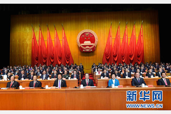 10月1日，慶祝中華人民共和國成立66周年暨新疆維吾爾自治區(qū)成立60周年大會在新疆人民會堂隆重舉行。 新華社記者 饒愛民 攝