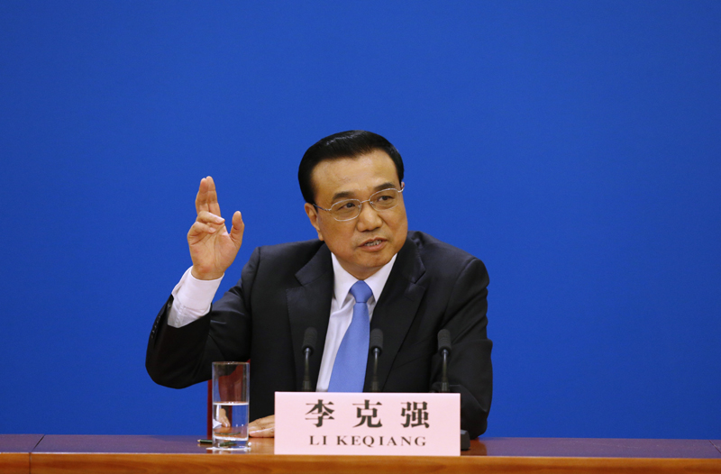 3月15日，國務院總理李克強在北京人民大會堂與中外記者見面，并回答記者提問。 新華社記者 沈伯韓 攝