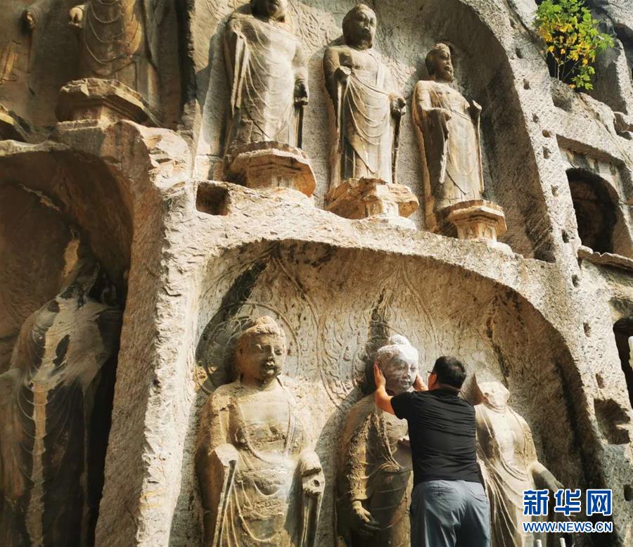 （圖文互動）（4）合體了，龍門石窟流散佛首首次實(shí)現(xiàn)“數(shù)字復(fù)位”