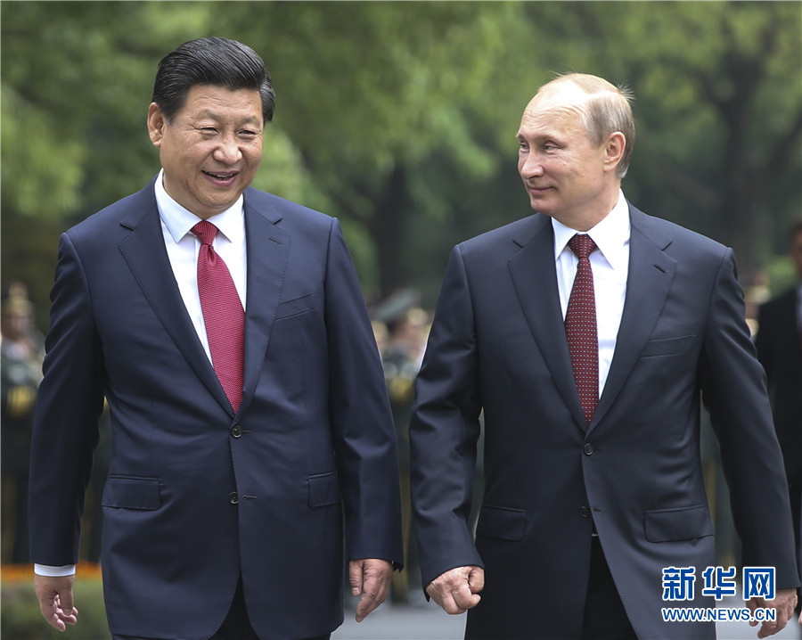 這是會談前，習近平在上海西郊會議中心廣場為普京舉行歡迎儀式。新華社記者 蘭紅光 攝 