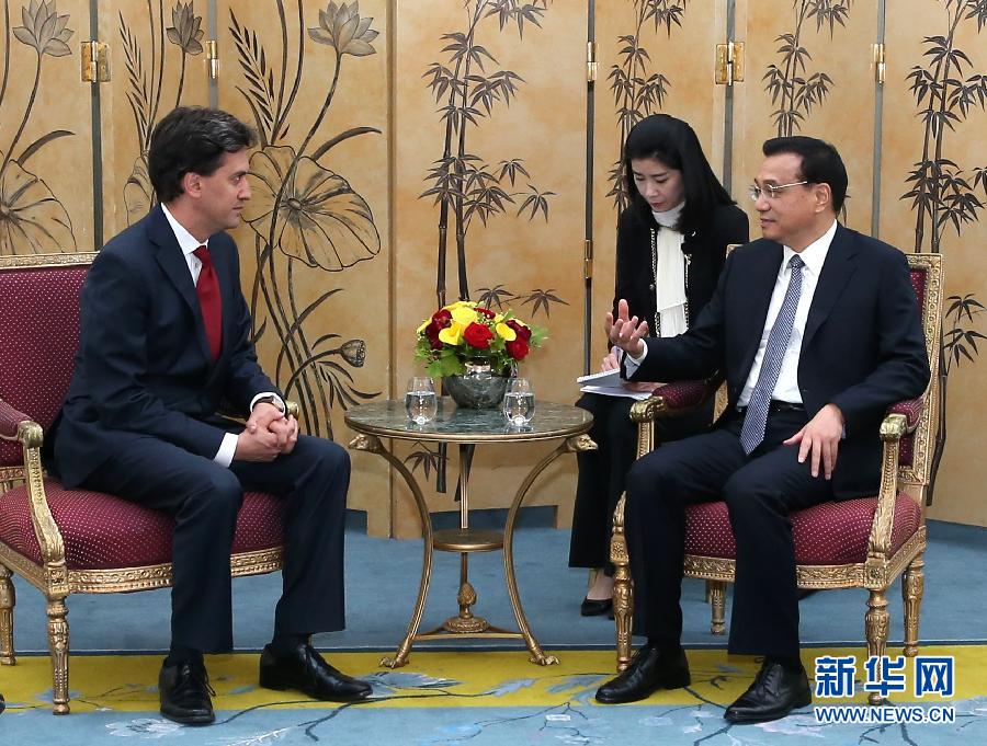 6月18日，國務(wù)院總理李克強在倫敦會見英國工黨領(lǐng)袖埃德·米利班德。新華社記者 龐興雷 攝