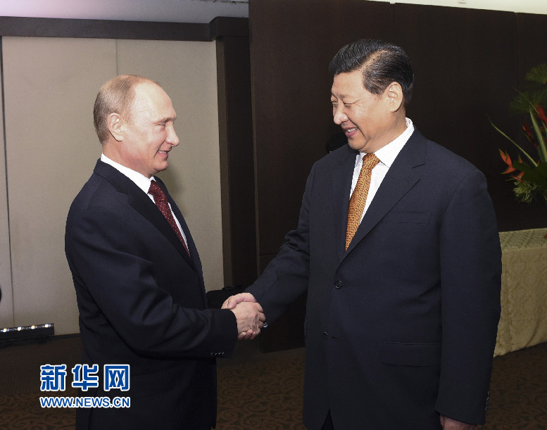 7月14日，國(guó)家主席習(xí)近平在巴西福塔萊薩會(huì)見(jiàn)俄羅斯總統(tǒng)普京。新華社記者李學(xué)仁攝