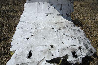 MH17墜機現場照片下藏著多少信息？