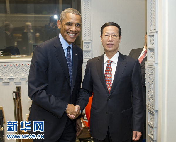 9月23日，國家主席習(xí)近平特使、國務(wù)院副總理張高麗在紐約會見出席聯(lián)合國氣候峰會的美國總統(tǒng)奧巴馬。 新華社記者王曄攝