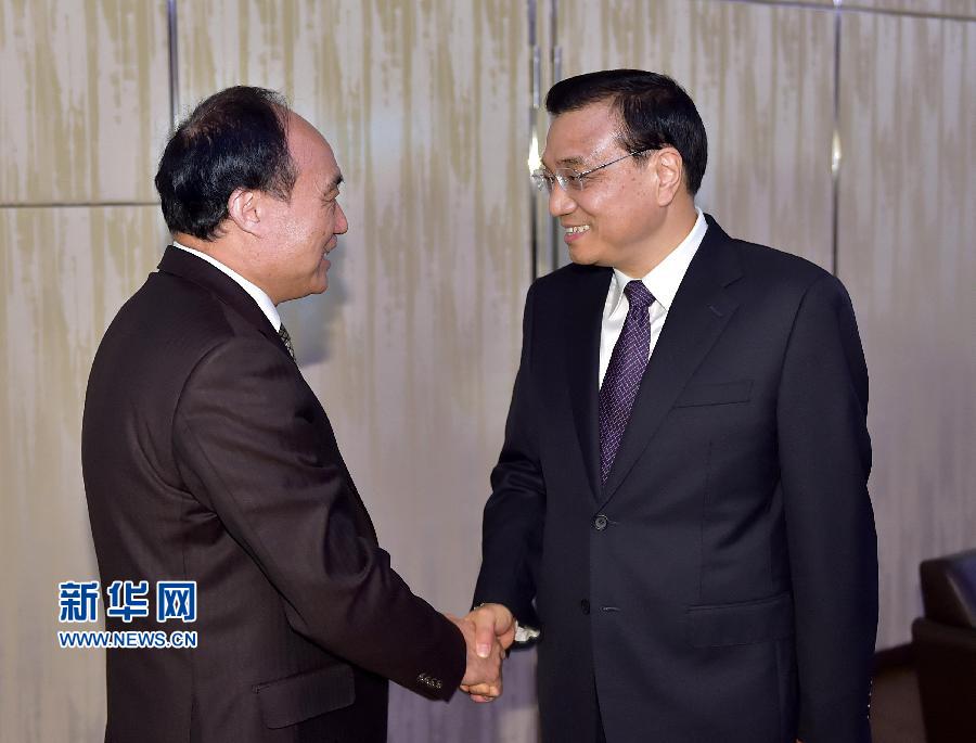 1月22日，中國國務(wù)院總理李克強(qiáng)在瑞士蘇黎世會見國際電信聯(lián)盟秘書長趙厚麟。 新華社記者 李濤 攝 
