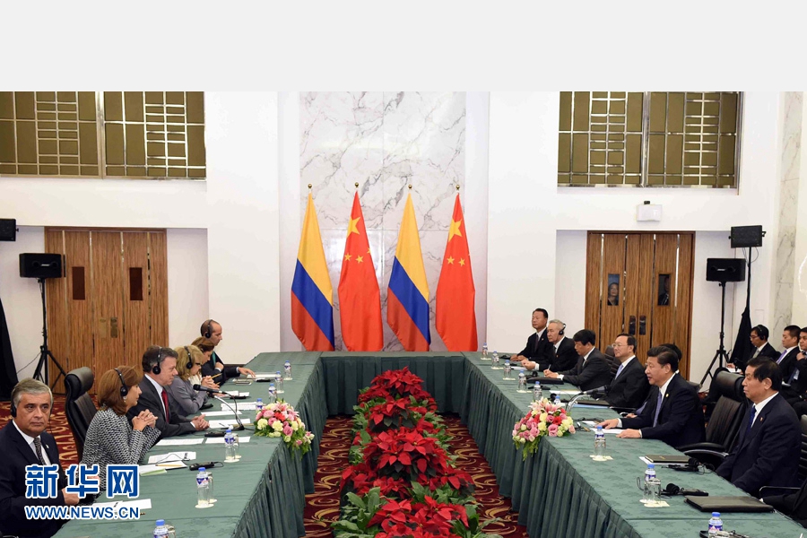 11月18日，國家主席習(xí)近平在菲律賓馬尼拉會見哥倫比亞總統(tǒng)桑托斯。 新華社記者 饒愛民 攝