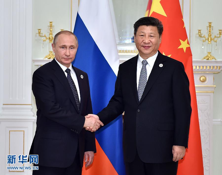 6月23日，國家主席習(xí)近平在烏茲別克斯坦塔什干會(huì)見俄羅斯總統(tǒng)普京。新華社記者李濤攝